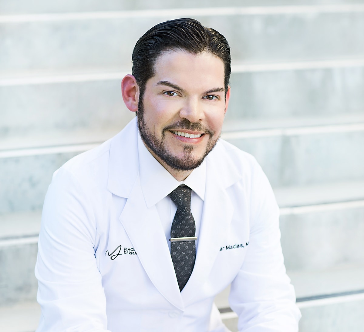Dr. Edgar S. Macias in his white coat