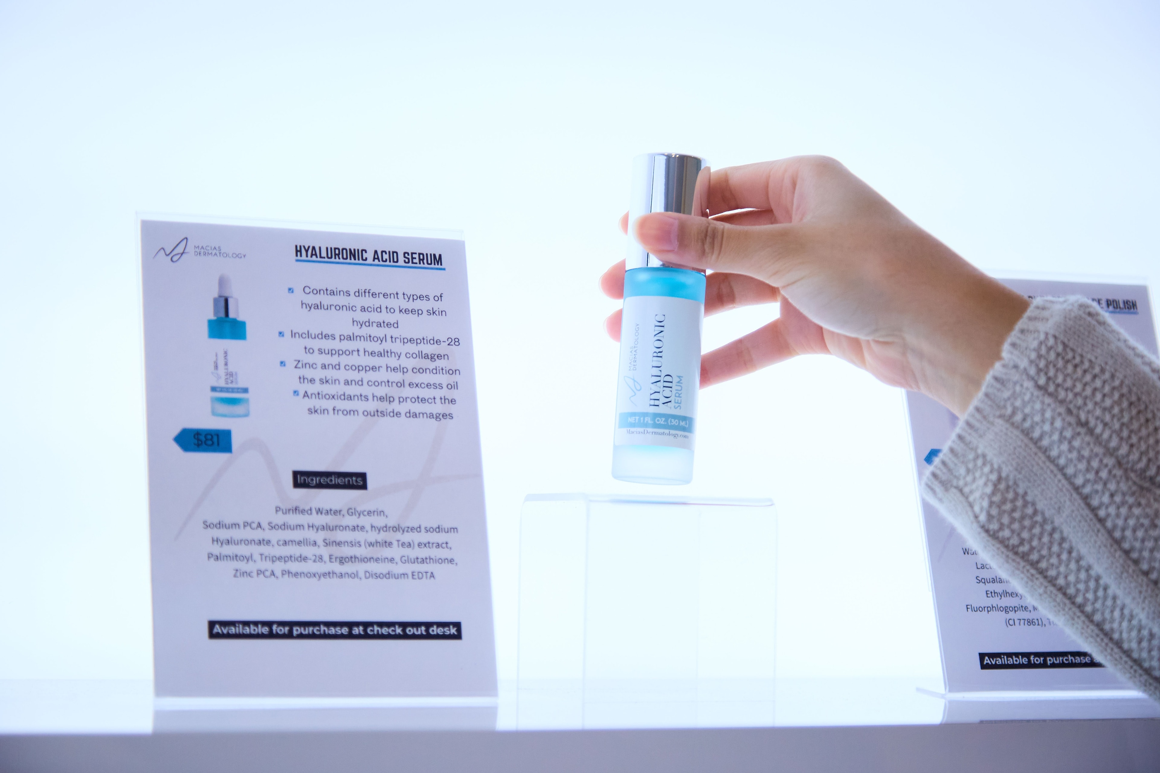 A hyaluronic acid serum from the clinic's skincare wall
